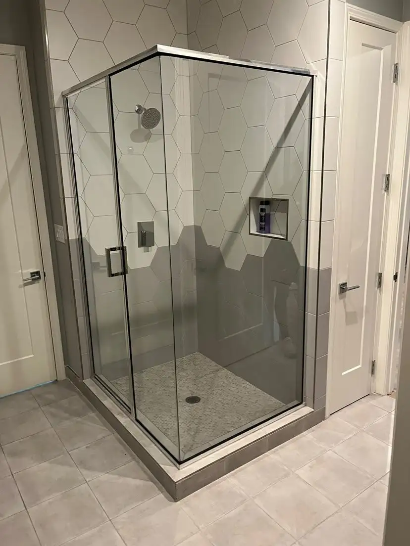 Bathroom remodel with custom glass shower by Atlas Gate Home Services